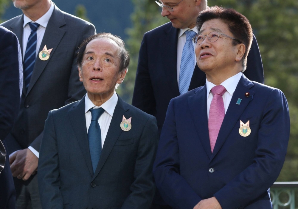 Japan and U.S. finance officials back market control of foreign exchange rates